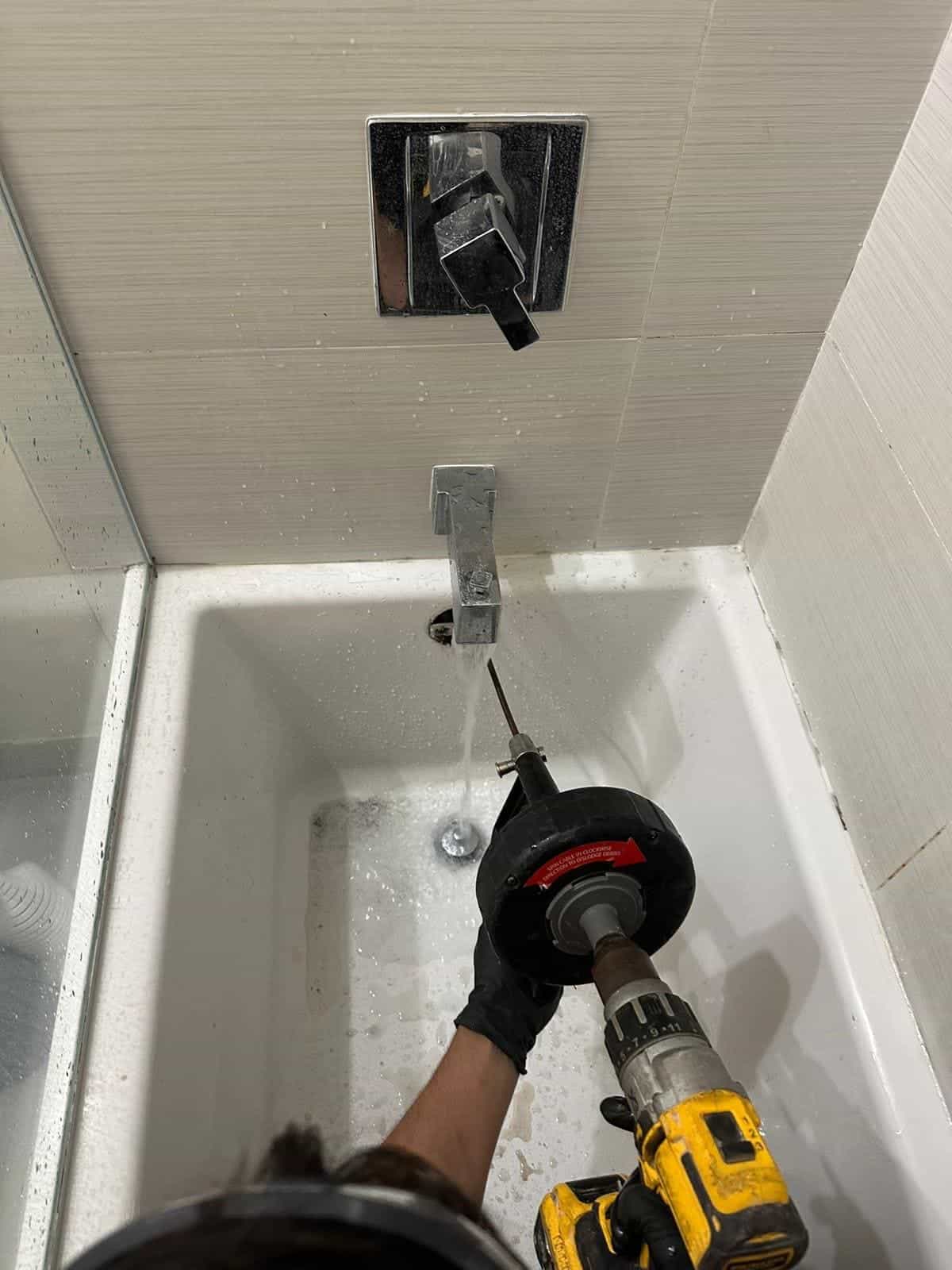Before and after of a Drain cleaning by a plumber in Tamiami