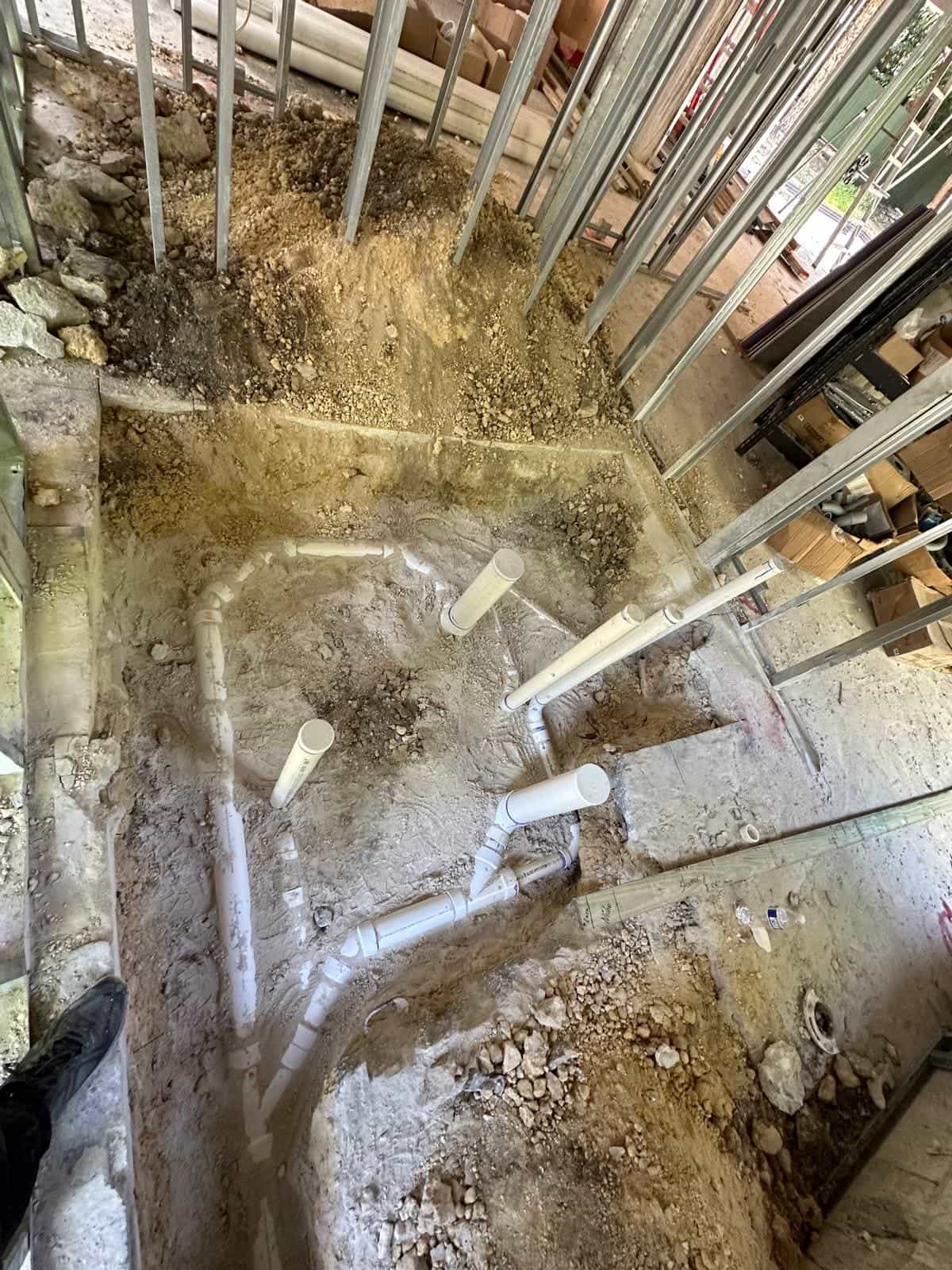 Before and after of a Underground pipe assemply by a plumber in Tamiami